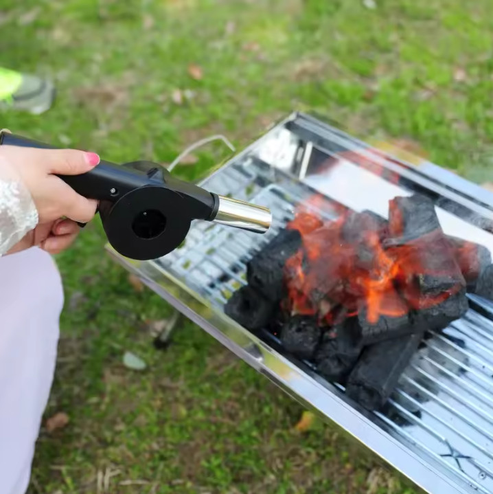 Ventilador de mano para encender carbón